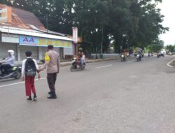 Personel Polsek Rasanae Timur Laksanakan Gatur Pagi untuk Kelancaran Lalu Lintas