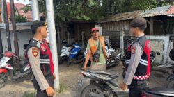 Personel Sat Samapta Polres Lombok Utara Laksanakan Patroli Dialogis Bersama Juru Parkir di Pasar Tanjung