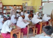 Polsek Sape Pantau Kegiatan Makan Bergizi Gratis di SDN Inpres 01 Naru