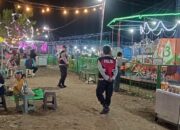 Polsek Kayangan Kawal “Pasar Rakyat Rona-Rona”, Pastikan Keamanan Pengunjung Lapangan Umum Kayangan