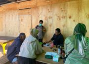 Bhabinkamtibmas Desa Belo Dampingi Pengambilan Sampel Darah Warga, Wujud Sinergi Polri Dukung Kesehatan Masyarakat