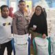 Bhabinkamtibmas Polres Bima Kota Awasi Pembagian Beras Bantuan Badan Pangan Nasional