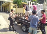 Bhabinkamtibmas Desa Teros Monitoring Penerimaan Bantuan Beras Pemerintah untuk 610 KK
